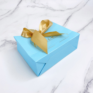 Bolsas de Papel Azules Mini Baratas al por Mayor con Lazo Grande Dorado - Bolsas de Regalo Pequeñas de Lujo para Joyería y Cosméticos - Product Image 1