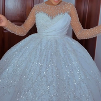 Robe de mariée élégante à manches longues avec perles 2026 |   Robe de bal en tulle volumineux avec corsage plissé orné de paillettes pour femmes noires
