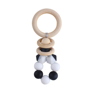 Nouveau bricolage créatif <span class=keywords><strong>anneau</strong></span> en bois <span class=keywords><strong>Gel</strong></span> <span class=keywords><strong>de</strong></span> <span class=keywords><strong>dentition</strong></span> bébé apaisant bicolore Silicone jouet pour grincer des dents - Product Image 2