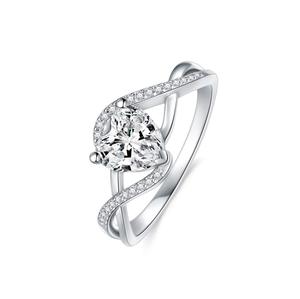 แหวนหมั้นทองคำขาว 14K แบบคลาสสิกสำหรับผู้หญิง ดีไซน์แหวนแยกส่วนประดับเพชรโมอิสซาไนต์รูปหัวใจ 1 กะรัต - Product Image 1
