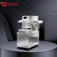 Machine d'emballage sous vide continu YT-TT350 pour produits frais avec équipement de scellage pour poissons et volailles, et aliments cuits