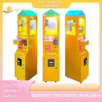 Meilleure vente : Mini machine de jeu de grue jaune, à monnayeur électrique, en métal, distributeur de prix à monnayeur, jouet, Garantie 1 an, Transfrontalier