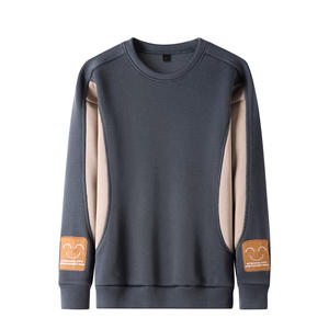 Camisetas de moda para hombres jóvenes, camisetas informales de otoño e invierno con colores sólidos y corte holgado, finas y de cuello redondo. - Product Image 3