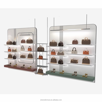 Vitrine de présentation de sacs à main tendance avec éclairage, armoire murale pour sacs, couches personnalisées pour l'affichage en magasin