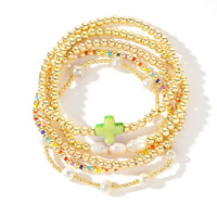 Mode été coloré coquille perle croix or perle empilage Bracelet cuivre bijoux charme cadeau pour les femmes en gros accessoires