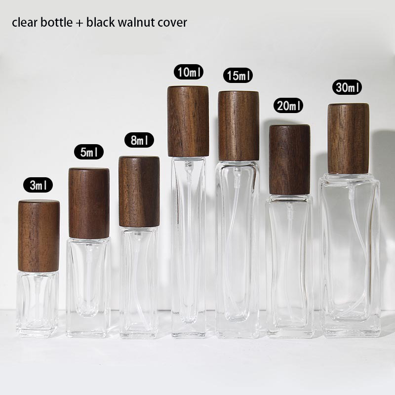 Transparent bottle with black walnut wood cap