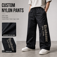 Pantalon Homme Marque Privée Léger en Nylon Coupe Large avec Cordon de Serrage Imprimé Sérigraphié Poches Latérales Style Décontracté Streetwear