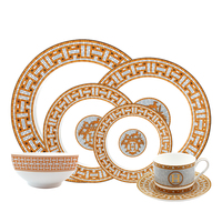 Service de table de luxe en porcelaine fine H Bone China avec assiettes de présentation en céramique orange, tasses à café et bols pour événements de mariage