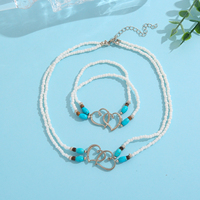 Ensemble de bijoux en alliage plaqué cuivre blanc et turquoise, collier et bracelet avec breloques en forme de cœurs entrelacés en argent, cadeau pour femmes