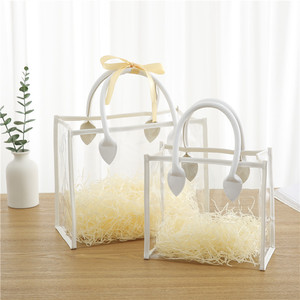 FS 다이너텍 맞춤형 로고 토트백 투명 <span class=keywords><strong>PVC</strong></span> 선물 가방 화장품 포장용 손잡이 포함 - Product Image 1