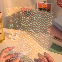 Film de stratifié froid auto-adhésif holographique A4 en feuilles/rouleaux tous modèles Bopp pour les projets de décoration et d'artisanat