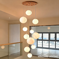 Lustre moderne minimaliste et élégant pour villa de luxe, loft, maison duplex, escalier ouvert