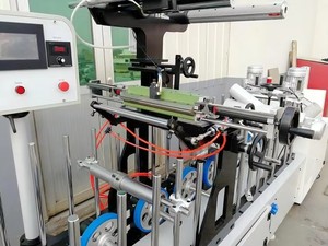 Machine d'enveloppement <span class=keywords><strong>de</strong></span> cadres <span class=keywords><strong>de</strong></span> portes en <span class=keywords><strong>bois</strong></span>/MDF/aluminium avec colle thermofusible PUR, machine d'enveloppement <span class=keywords><strong>de</strong></span> profilés <span class=keywords><strong>de</strong></span> cadres <span class=keywords><strong>de</strong></span> portes en film PVC/papier/placage - Product Image 5