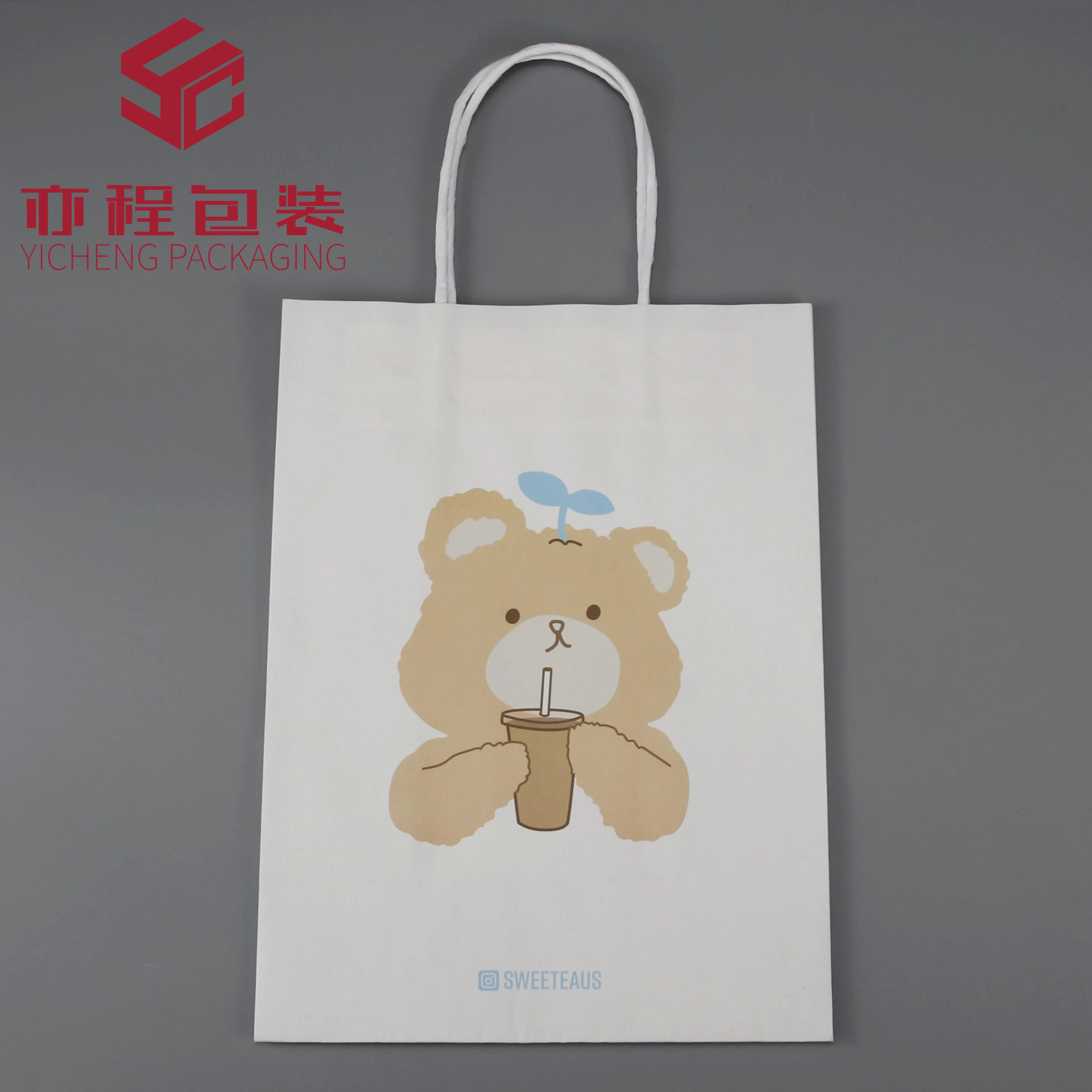 YICHENG 100% Recyclable Eco-friendly Reinforced Handle Craft Paper Bags Custom Printed Logo Solid Durable Bottom