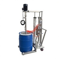 Pompe à vis pneumatique pour le transfert de concentrés et purées de fruits épais, avec plaque de pression de levage
