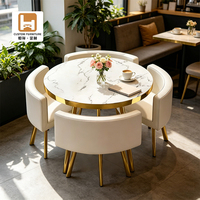 Juego de Mesa de Comedor Redonda de Mármol y Metal para 4 Personas con 4 Sillas, Muebles de Cocina Pequeños Modernos y Minimalistas Personalizados 2026