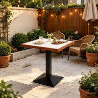Table en pierre frittée au design rétro, idéale pour les lieux extérieurs tels que les cafés et les restaurants, facile à nettoyer et à ranger.