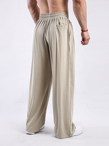Ropa deportiva informal con logotipo personalizado para hombre, ropa de calle ligera de poliéster, pantalones para correr, pantalones de chándal holgados para entrenamiento en el gimnasio - Product Image 3