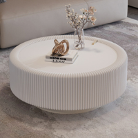 Table basse ronde moderne à cannelures avec plateau en verre trempé, corps en cuir PU, base en métal émaillé et rangement dissimulé