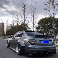 Kit carrosserie pour Mercedes-Benz Classe C W204 C63 AMG, style Robot, comprenant pare-chocs avant, diffuseur arrière et jupes latérales