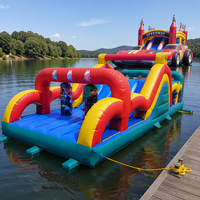 Parc de jeux gonflables commercial géant avec toboggans aquatiques et châteaux gonflables en promotion