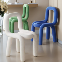 Chaise de salon de style américain moderne et luxueux, avec pieds en métal, dossier rembourré en peau de mouton, forme non standard, pour restaurant