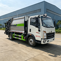 Camion compacteur de déchets puissant Sinotruk HOWO 8CBM avec structure de chargement arrière pour la collecte et l'expédition de déchets industriels