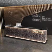 Bureau de réception commercial de luxe moderne noir en bois écologique avec LED pour hôtels, spas, salons, gymnases, bars nocturnes et meubles de sous-sol
