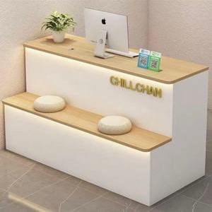 Modern White Reception <b>Desk</b> with Gold Trim and Seating for <b>Salon</b> or Retail Store - Product Image 1