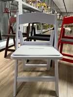 Chaise de salle à manger pliable en résine plastique, capacité de charge élevée, empilable et portable pour la location d'hôtels et de salles de réception