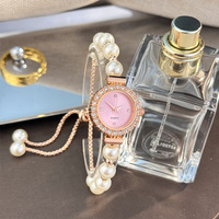 Montre-bracelet élégante pour femme, réglable, romantique, avec perles blanches, à cordon, mouvement à quartz, cadran orné de strass (WA386)