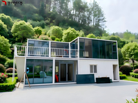 Maisons conteneurs plates personnalisées de 20 pieds avec murs-rideaux en verre, installation facile, caractéristiques détachables, design moderne pour chambre et salon