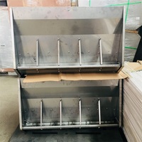 Mangeoire à porcs en acier inoxydable à 10 trous double face pour élevage porcin