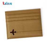 Porte-cartes de crédit en cuir PU de 4 pouces avec logo personnalisé en relief pour cadeaux de bureau en gros