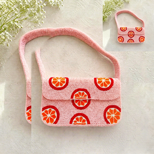Sac à main rectangulaire rose brodé à la main en polyester, lavable, avec perles et motif tranches d'orange - Product Image 1