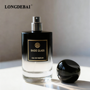 Elegante y Sencilla Botella de Perfume de Vidrio Cilíndrica Negra de 100 ml con Pulverizador y Caja Personalizable - Product Image 3