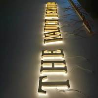 Lettres en relief personnalisées à canal inversé, enseigne rétroéclairée par LED 3D, cadre en acier inoxydable, panneau arrière en acrylique, enseigne publicitaire