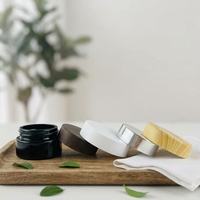 Pot cosmétique en verre vide noir mat personnalisé de luxe 30g 20g 50g 50 ml 100g 100ml avec couvercles