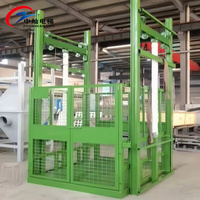 Monte-charge hydraulique extérieur avec cage de protection en treillis métallique, élévateur industriel pour le chargement en entrepôt