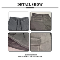 Short cargo pour homme gris pierre, taille entièrement élastique, poches cargo latérales à rabat, poche arrière à rabat, ourlet brut avec détail cordon de serrage