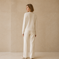 Fabricant de vêtements en tricot sur mesure, pulls en cachemire et laine avec perles et paillettes, techniques artisanales pour les designers