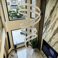 Luminaire suspendu professionnel personnalisé en cristal K9 en forme de double spirale LED pour escalier duplex, villa, salon