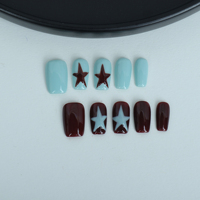 Uñas artificiales hechas a mano con estrellas de doble color pintadas a mano, uñas reutilizables de alta calidad.