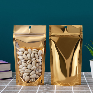 Feuchtigkeitsbeständiger, goldfarbener, transparenter Standbodenbeutel mit wiederverschließbarem Aluminiumfolien-Zipverschluss für die Aufbewahrung von Snacks und Nüssen. - Product Image 2