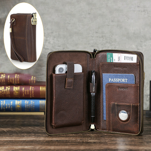 Organisateur de documents de voyage en cuir pleine fleur avec portefeuille RFID, porte-AirTag, porte-stylo et pochette de poignet pour les voyages d'affaires quotidiens - Product Image 1