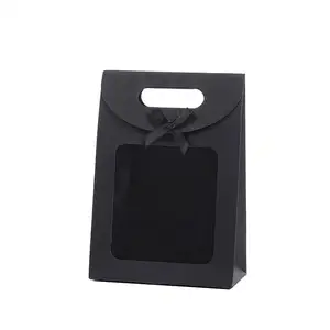 China Yiwu suppliers wholesale craft paper material food package transparent window black gift bag for wedding parties souvenirs