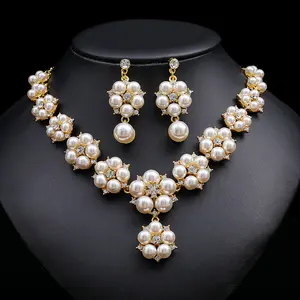 Женские серьги с золотым кулоном - Product Image 1