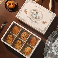 Boîte en papier pliée sur mesure, design exquis, écologique, nouveau design pour divers produits, pelliculage mat à feuille d'or pour le stockage alimentaire