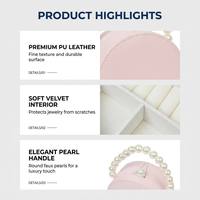Boîte à bijoux de luxe avec logo personnalisé, poignée en perles, boîte de voyage ronde en cuir PU miniature pour bagues et boucles d'oreilles, pour cadeau d'entreprise