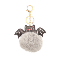 Vente en gros de porte-clés de Noël en peluche pour Halloween, boule bouffante en fourrure PU avec pompon et chauve-souris en alliage de zinc, porte-clés, pendentif à breloque pour